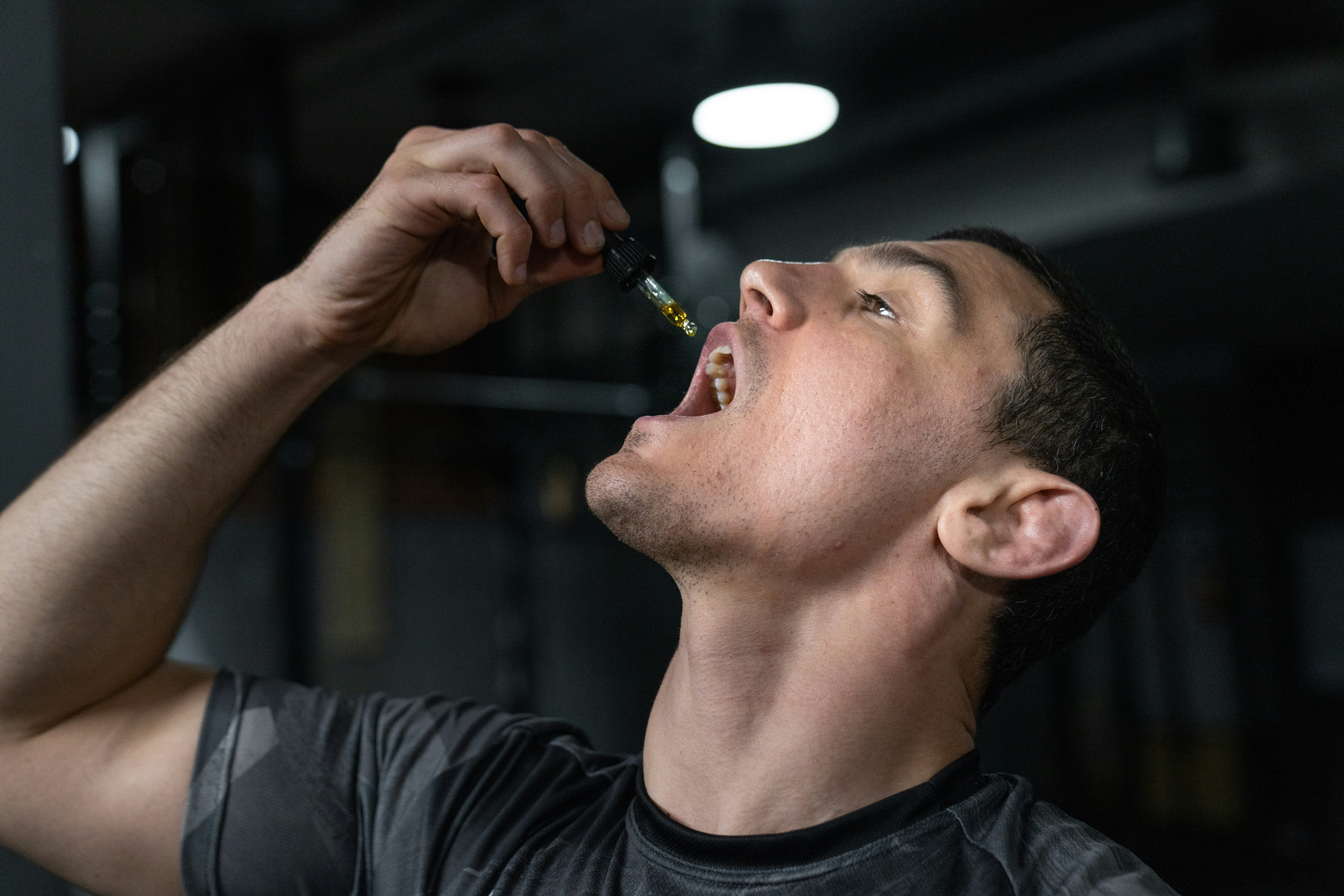 Person using cannabis oil in Niagara Falls after a cannabis delivery