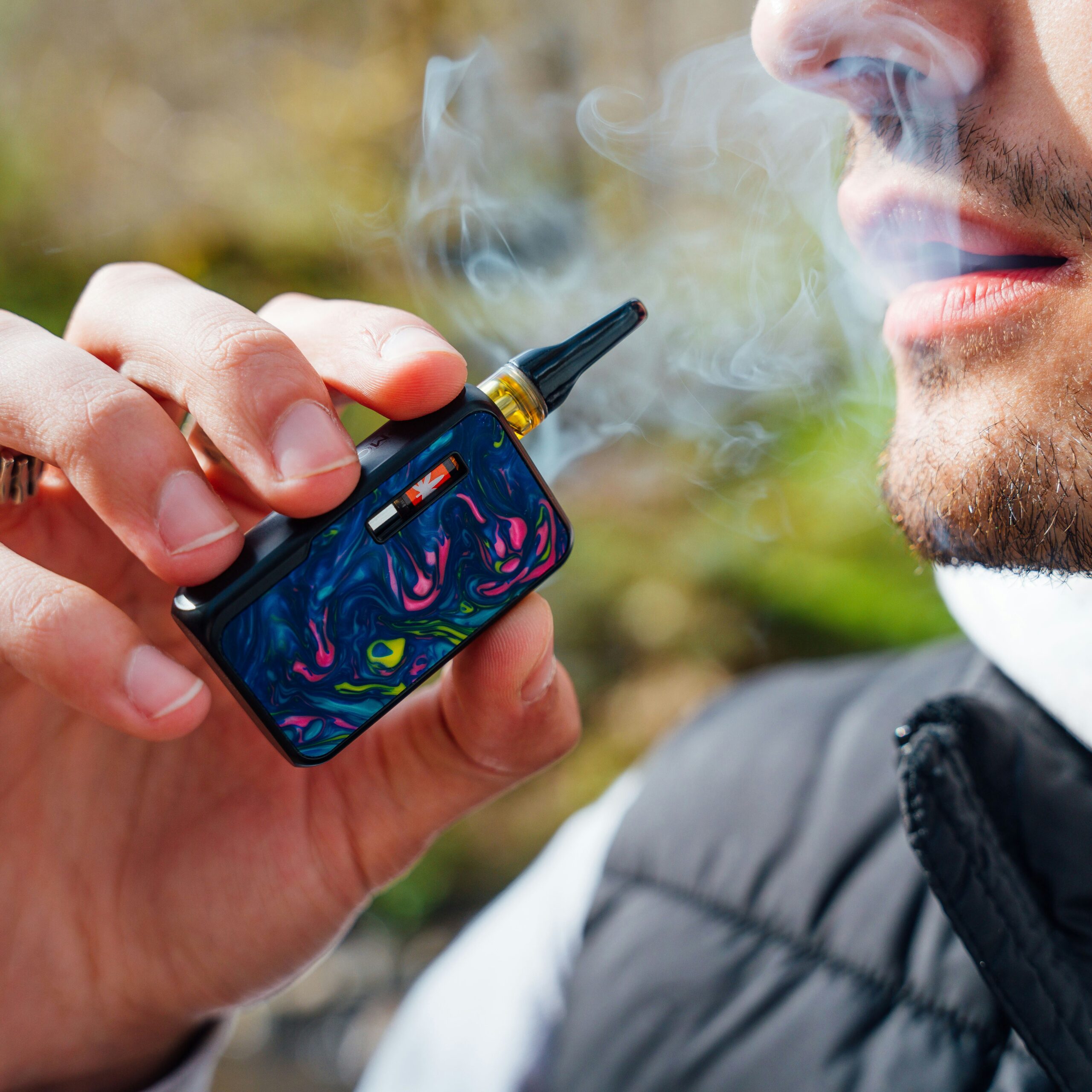Weed delivery Regina: Man vaping cannabis.