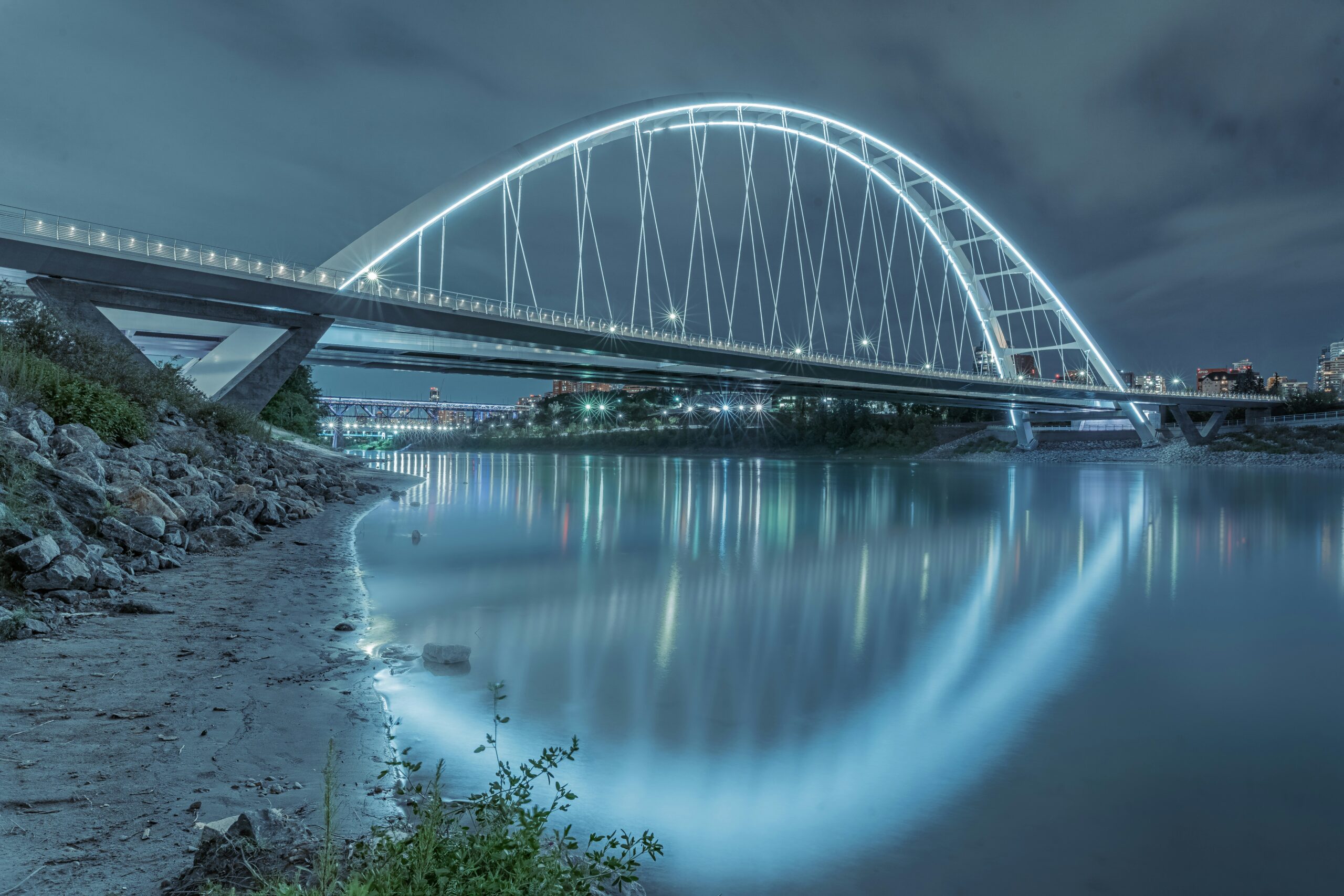 Walterdale Bridge illuminated at night over the North Saskatchewan River