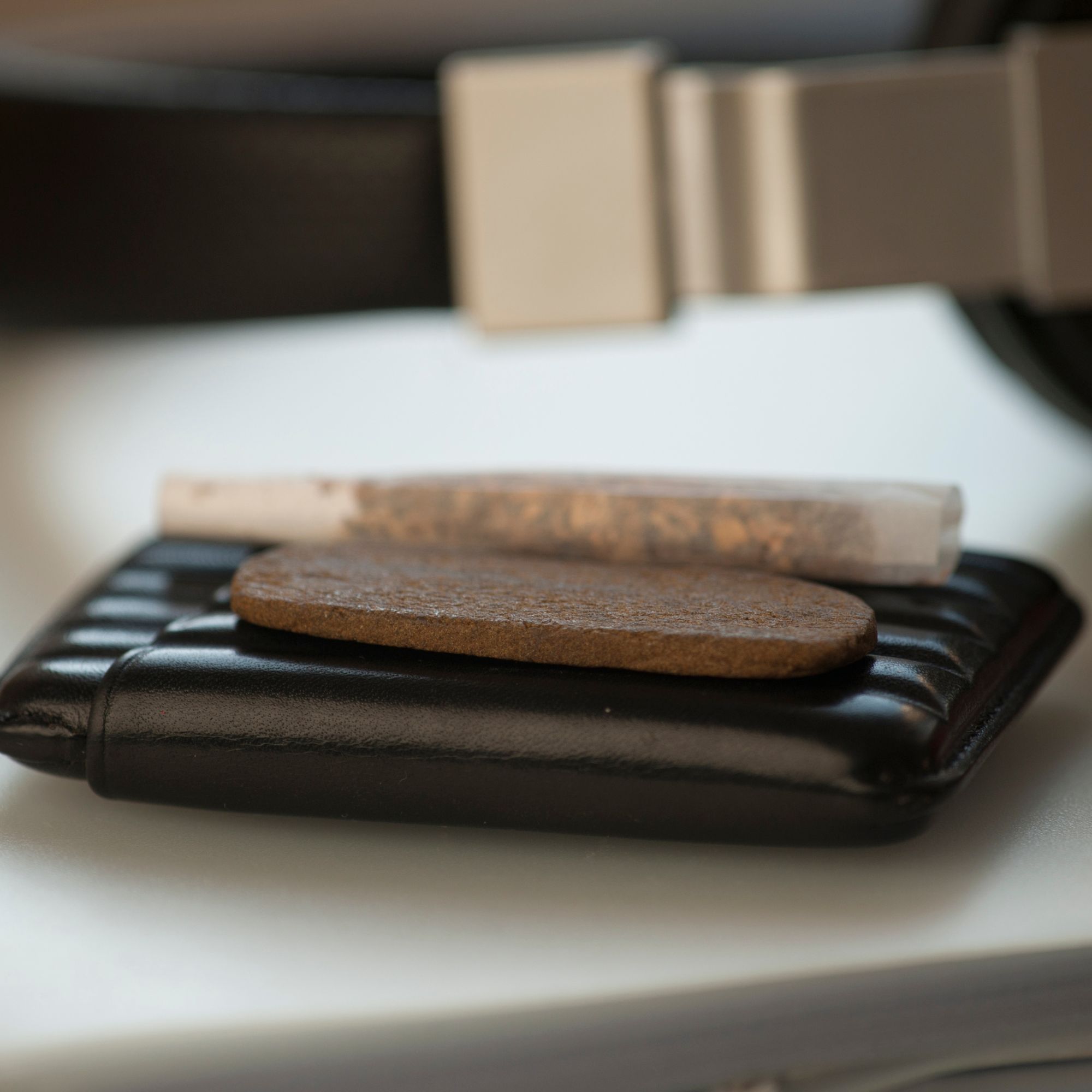 Moroccan Habibi Hash with a joint, illustrating premium quality hashish.