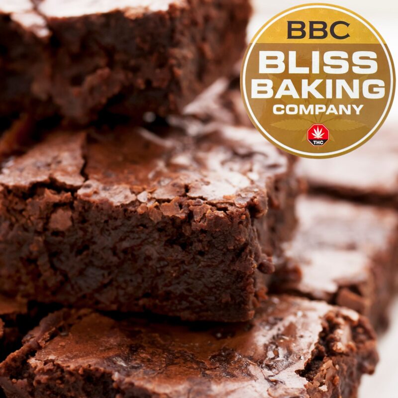 Close-up of Bliss Baking Company THC brownies showcasing a rich, fudgy texture and infused with premium D9 Distillate cannabis.